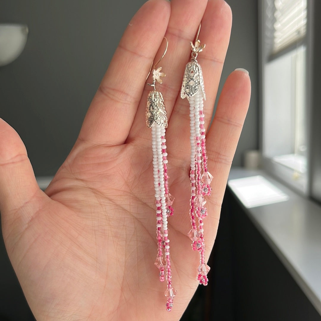 Adorable and has totally spring vibes! Sterling silver flower Hook earrings with crystal beads. Medium weight earrings. 